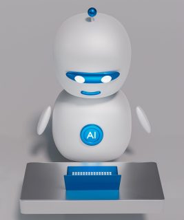 a white robot sitting on top of a table